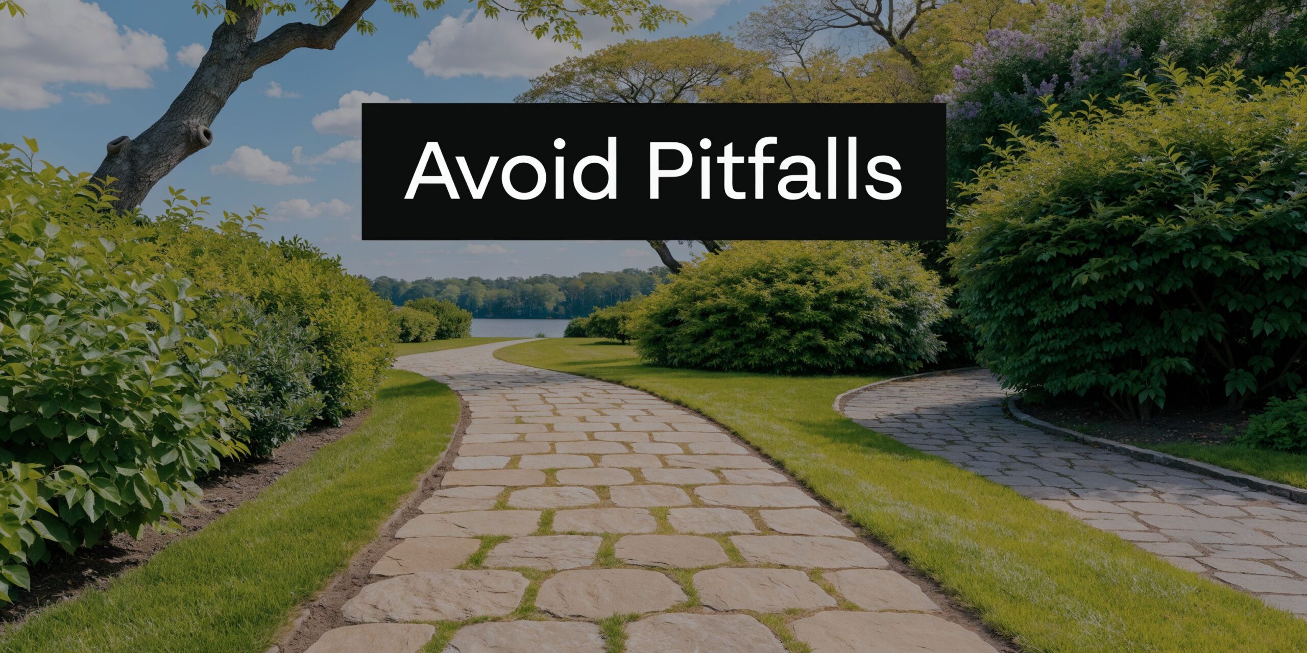 A stone walkway leading through a lush green park towards a lake, symbolizing the path of life.